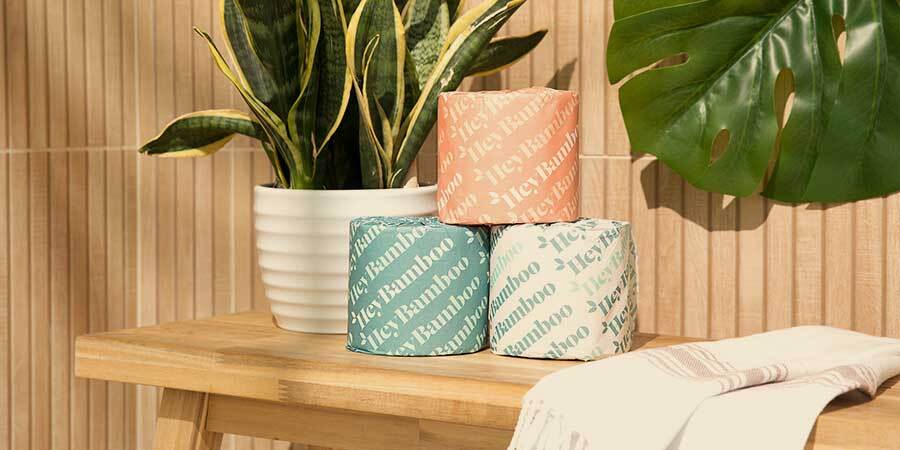a stack of 3 heybamboo rolls in colorful paper wrapping